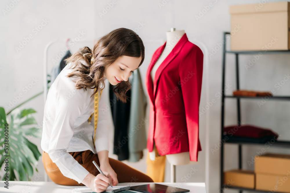 Fashion designers work at studios in the morning. Fashion designers work at studios in the morning.