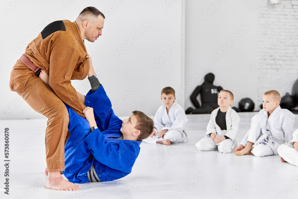 Foto de Teacher, professional judo, jiu jitsu coach training kinds
