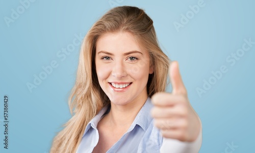 Wallpaper Mural Beautiful young woman show thumb up Torontodigital.ca