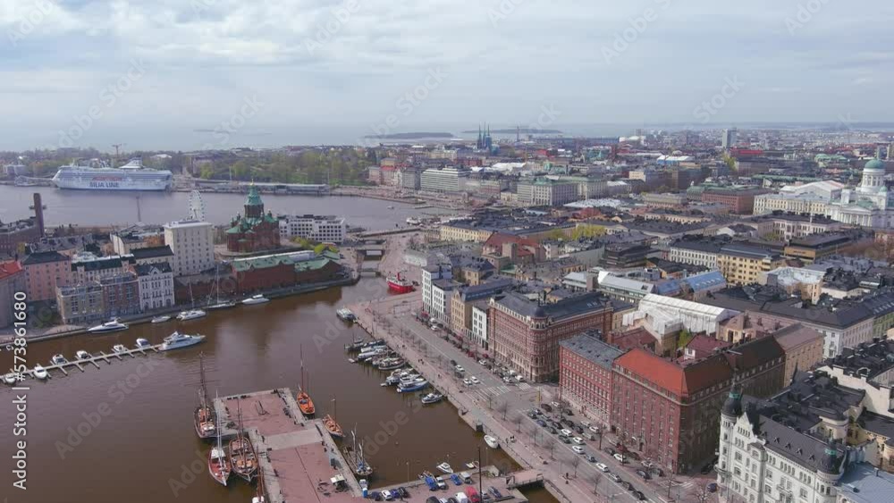 Helsinki: Aerial view of capital city of Finland in spring, Uspenski Cathedral surrounded by Baltic Sea - landscape panorama of Northern Europe from above Helsinki: Aerial view of capital city of Finland in spring, Uspenski Cathedral surrounded by Baltic Sea - landscape panorama of Northern Europe from above