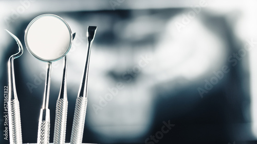 Dental instrument on xray background photo