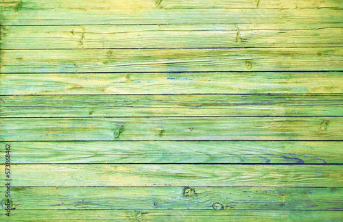 Soft green wood surface, with an abstract and expressive texture. Background for design