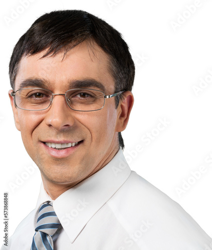 Portrait of handsome happy young man sitting with laptop with arms outstretched isolated on white