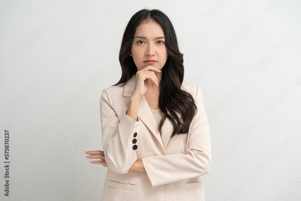 Asian young beautiful businesswoman face expression feel doubtful. Asian young beautiful businesswoman face expression feel doubtful.