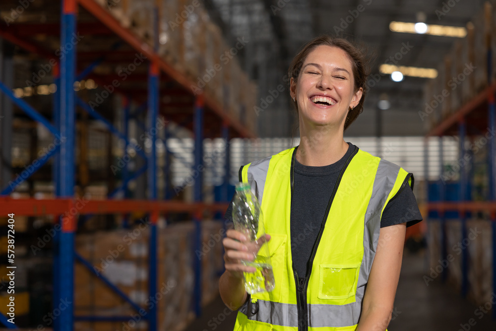 Engineer staff female laughing happy smile. woman worker real funny joke expression at workplace. Engineer staff female laughing happy smile. woman worker real funny joke expression at workplace.