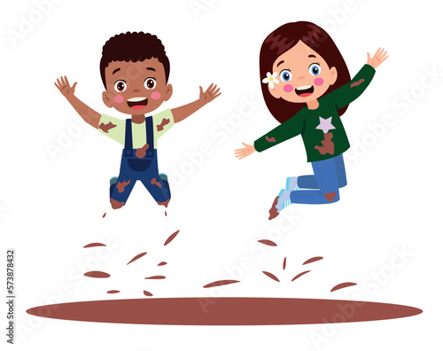 Cute happy kids jumping in mud