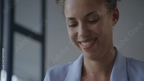 Woman emotions close up, businesswoman texting online photo