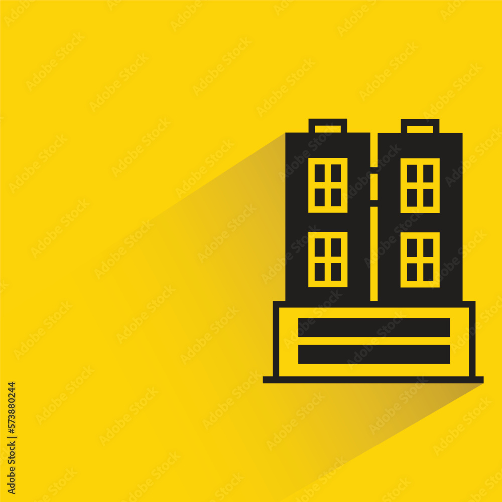 city building with shadow on yellow background