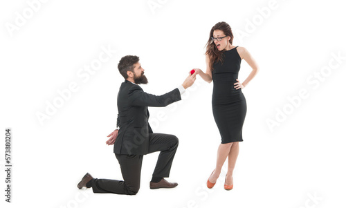 Happy young couple. tuxedo couple formal event. couple in love celebrate engagement. wedding party time. man on one knee making marriage proposal. Will you marry me. i said yes. happy valentines day