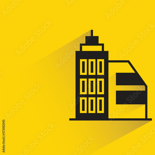 office building with shadow on yellow background