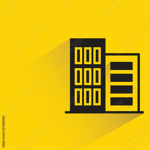 office building with shadow on yellow background