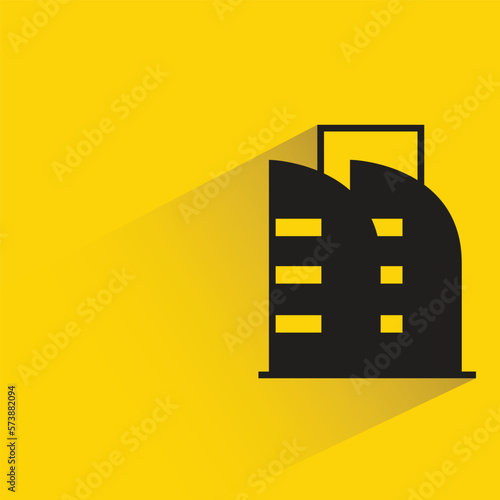 office building with shadow on yellow background