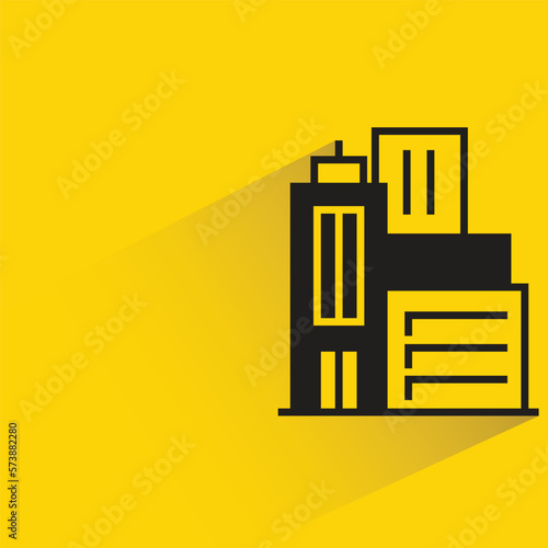office building with shadow on yellow background