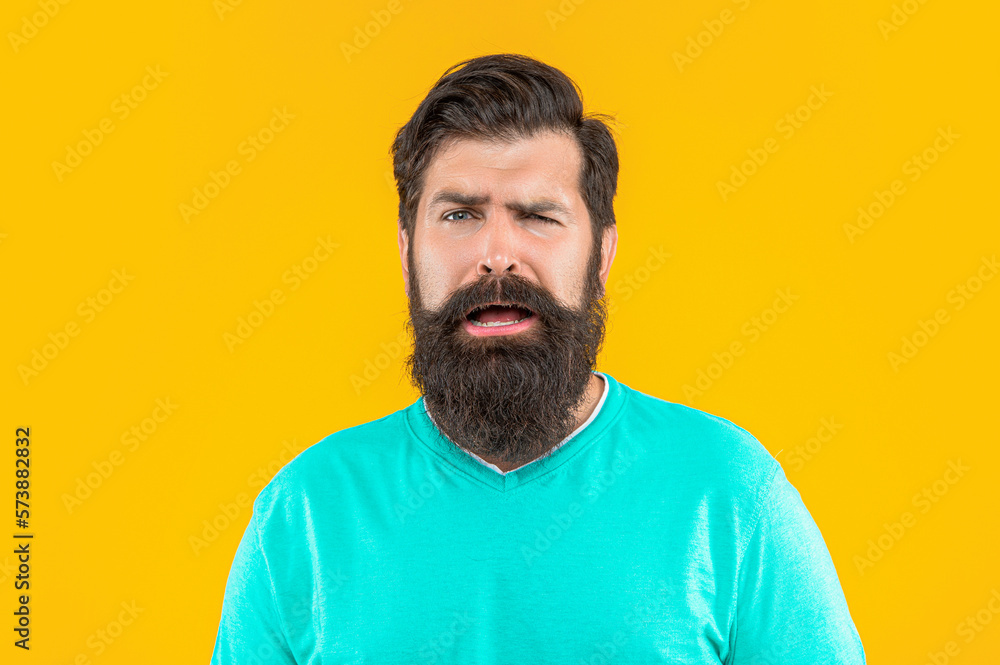 confused bearded man in studio. bearded man on background. confused bearded man in studio. bearded man on background.