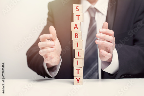 Photography Wooden bricks, business financial stability concept