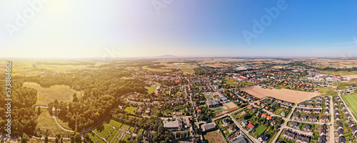 Aerial view of suburban neighborhood. Small town cityscape in countryside area. © Lazy_Bear