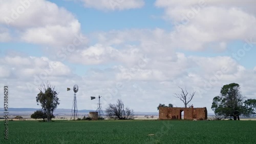 Flinders Rangers Orroroo Ruin in Field Windmill turning Windy 001 photo