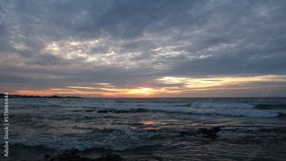 Beautiful evening sunset on coast of Jeju island with ocean water Beautiful evening sunset on coast of Jeju island with ocean water