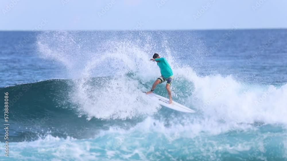 Video of surfer at blue ocean wave. High quality FullHD footage Video of surfer at blue ocean wave. High quality FullHD footage