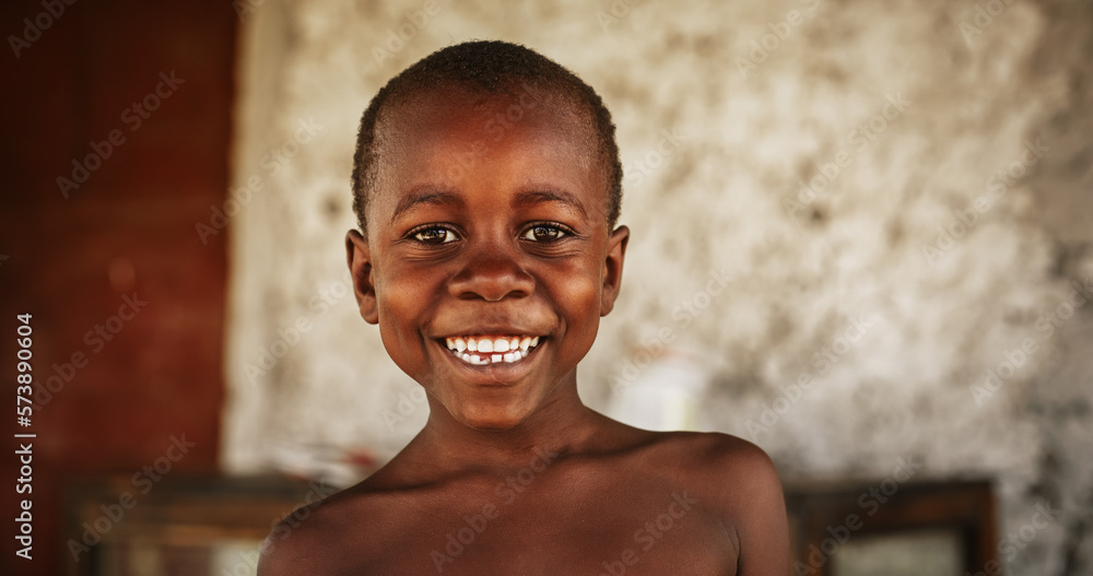 Close Up Portrait Of A Playful Authentic African Kid Looking At The close-up-portrait-of-a-playful-authentic-african-kid-looking-at-the
