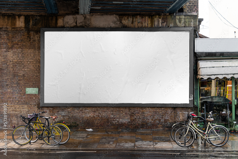 Blank billboard sign mockup in the urban environment, on the facade, empty space to display your advertising or branding campaign - obrazy, fototapety, plakaty 