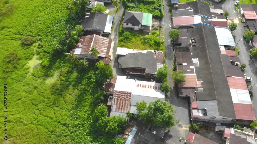 Stunning aerial view of houses and greenery - moving forward Stunning aerial view of houses and greenery - moving forward