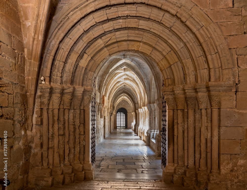Poblet Monastery. This Romanesque door is the one that gives access to the cloister. Until the medieval wall did not exist, it was out in the open. Tarragona, Spain