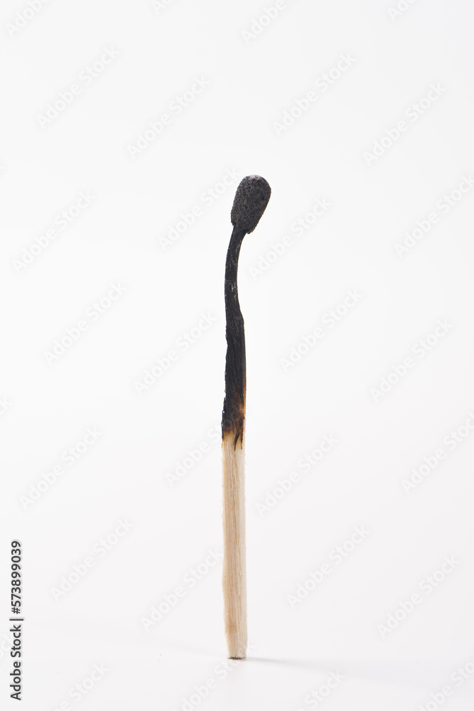 Burnt match isolated on white. background. Burnt match isolated on white. background.