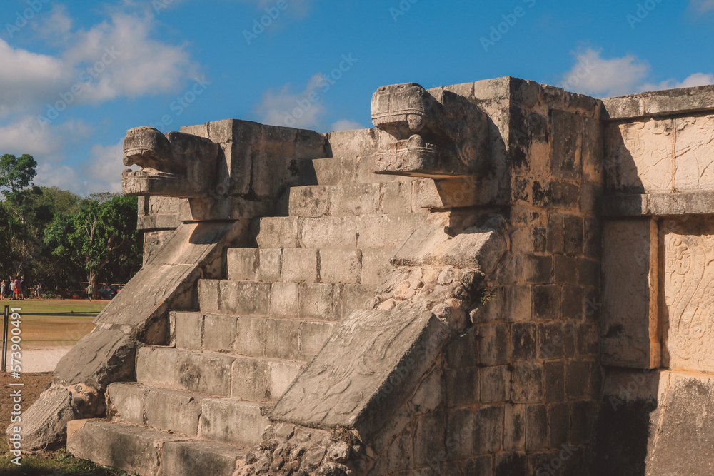 Fototapeta premium Stone Details and Patterns of an Ancient Ruins of the large pre-Columbian city Chichen Itza, built by the Maya people, Mexico