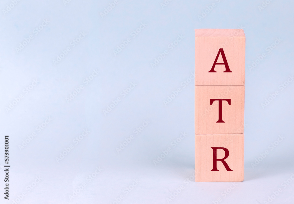 ATR on wooden cubes on a blue background ATR on wooden cubes on a blue background