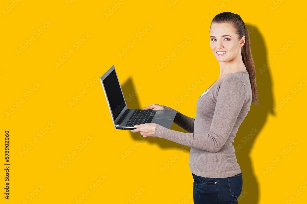 Happy business woman working with laptop Happy business woman working with laptop