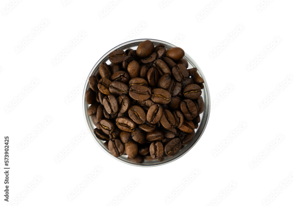 Coffee beans in a glass bowl isolated on white background. Close-up. Top view. Coffee beans in a glass bowl isolated on white background. Close-up. Top view.