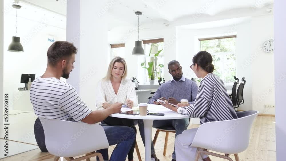 Business multi-ethnic team working together in a meeting. Business multi-ethnic team working together in a meeting.