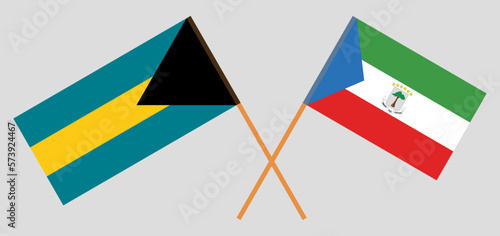 Crossed flags of the Bahamas and Equatorial Guinea. Official colors. Correct proportion photo