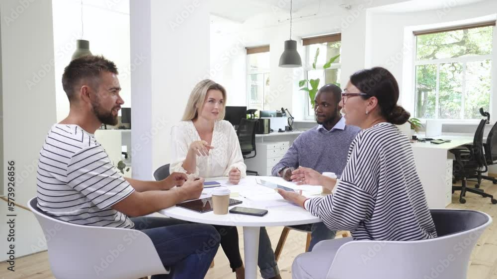 Business multi-ethnic team working together in a meeting. Business multi-ethnic team working together in a meeting.