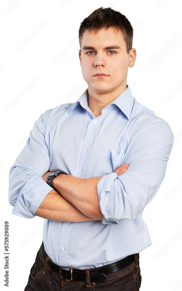 Portrait of a smart serious young man standing with cross hands Portrait of a smart serious young man standing with cross hands
