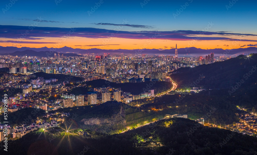 Seoul City skyline and downtown and skyscraper at night  is The best view and beautiful of South Korea at Namhansanseong mountain.