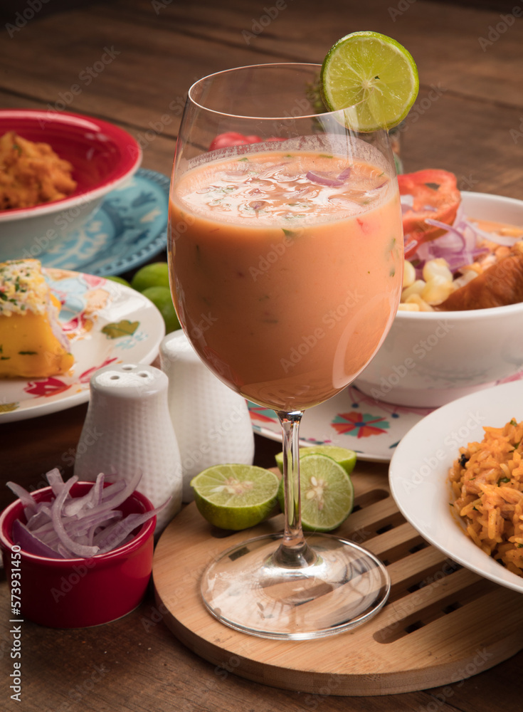 Leche de tigre Sea food ceviche Assorted food plates Peru traditional comfort food buffet table Leche de tigre Sea food ceviche Assorted food plates Peru traditional comfort food buffet table