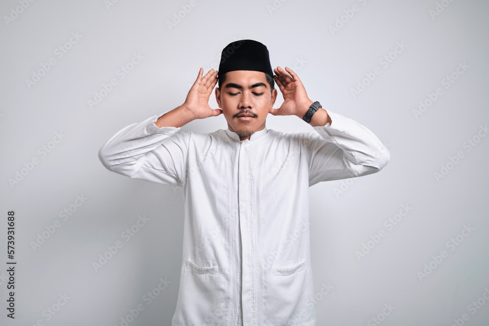 Asian muslim man doing the Asian muslim man doing the
