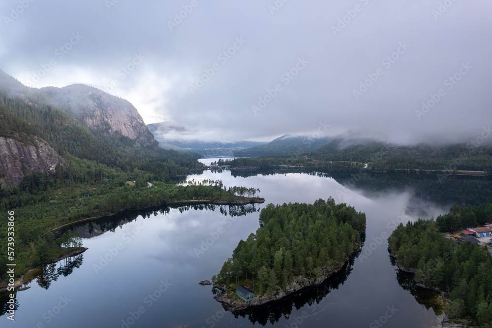 lake in the mountains in Norway on a foggy day