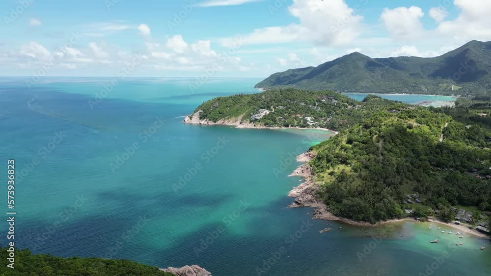 Aerial video of a stretch of beach with turquoise water color on a sunny day Aerial video of a stretch of beach with turquoise water color on a sunny day