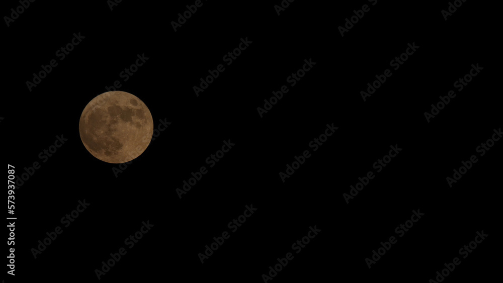 close up full moon passing by over sky, time lapse. copy space for text, logo, icon. Moon surface. Copy space close up full moon passing by over sky, time lapse. copy space for text, logo, icon. Moon surface. Copy space