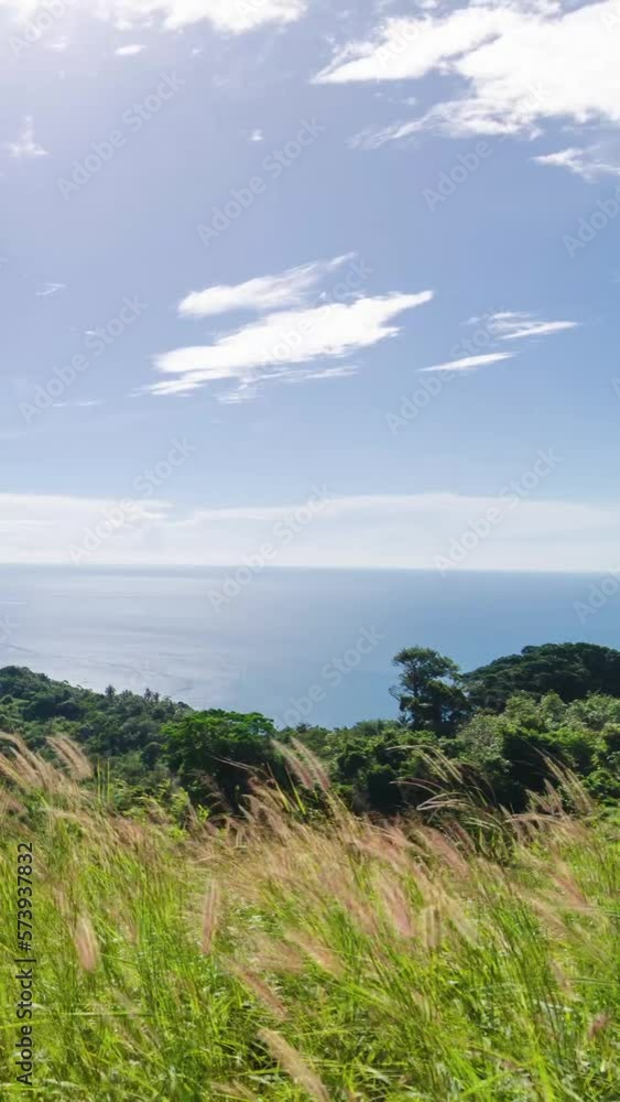 vertical Timelapse natural beautiful view of sea coast cliff in sunny day in south of thailand, phuket, mountain island in ocean sea in summer vertical Timelapse natural beautiful view of sea coast cliff in sunny day in south of thailand, phuket, mountain island in ocean sea in summer