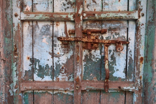 vintage rusted lock in old door