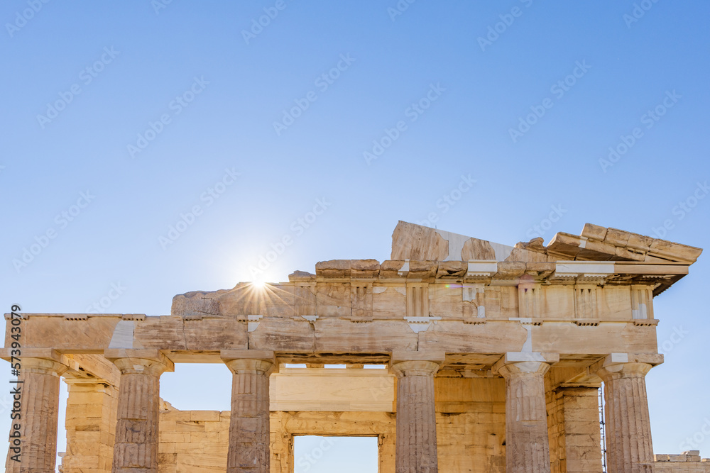 Ancient column at Acropolis site on a sunny evening in Athens Greece