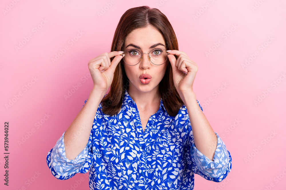Portrait of impressed lady arms touch glasses pouted lips cant believe isolated on pink color background Portrait of impressed lady arms touch glasses pouted lips cant believe isolated on pink color background