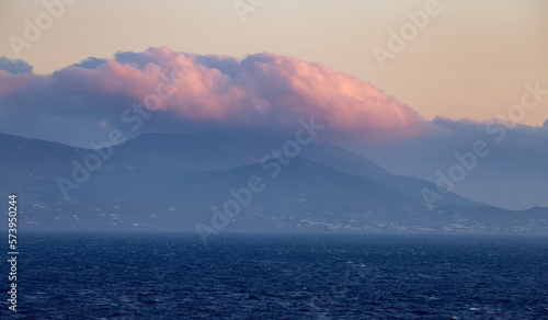 Island on Mediterranean Sea. Tinos, near Mikonos, Greece, Europe. Nature Background. Sunrise Sky