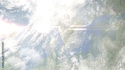Earth zoom in from outer space to city. Zooming on Lerum, Sweden. The animation continues by zoom out through clouds and atmosphere into space. Images from NASA photo