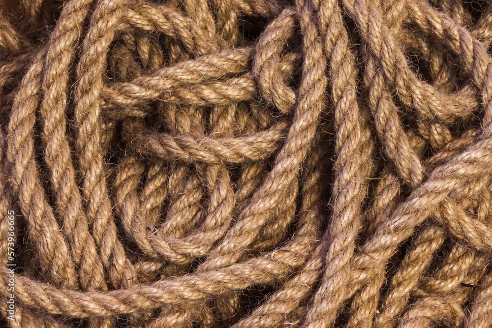 Abstract ropes, cables, hems background, Tangled rope rope background. Jute rope. Shot up close Abstract ropes, cables, hems background, Tangled rope rope background. Jute rope. Shot up close