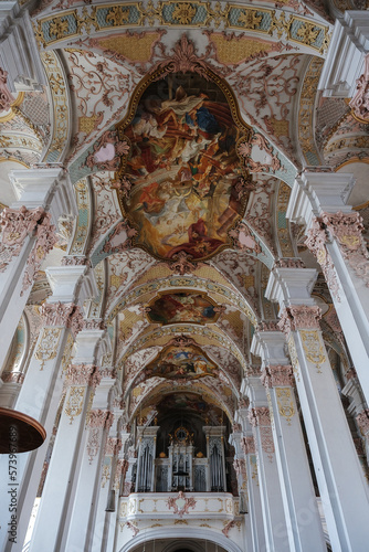 Magnificent opulent splendid Bavarian baroque church cathedral basilica interiors with stucco  murals  altar  Pilars  ceiling paintings  gold  wood domes nave